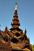 Old Bagan Myanmar. The Nat Taung monastery complex. Examples of the woodcraftsmen's art of the horn-like projections and avian forms on the roofs.